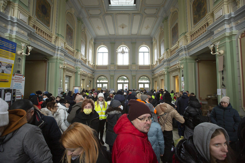 Refugees from Ukraine flood the main hall at the Przemysl train station in southern Poland. 