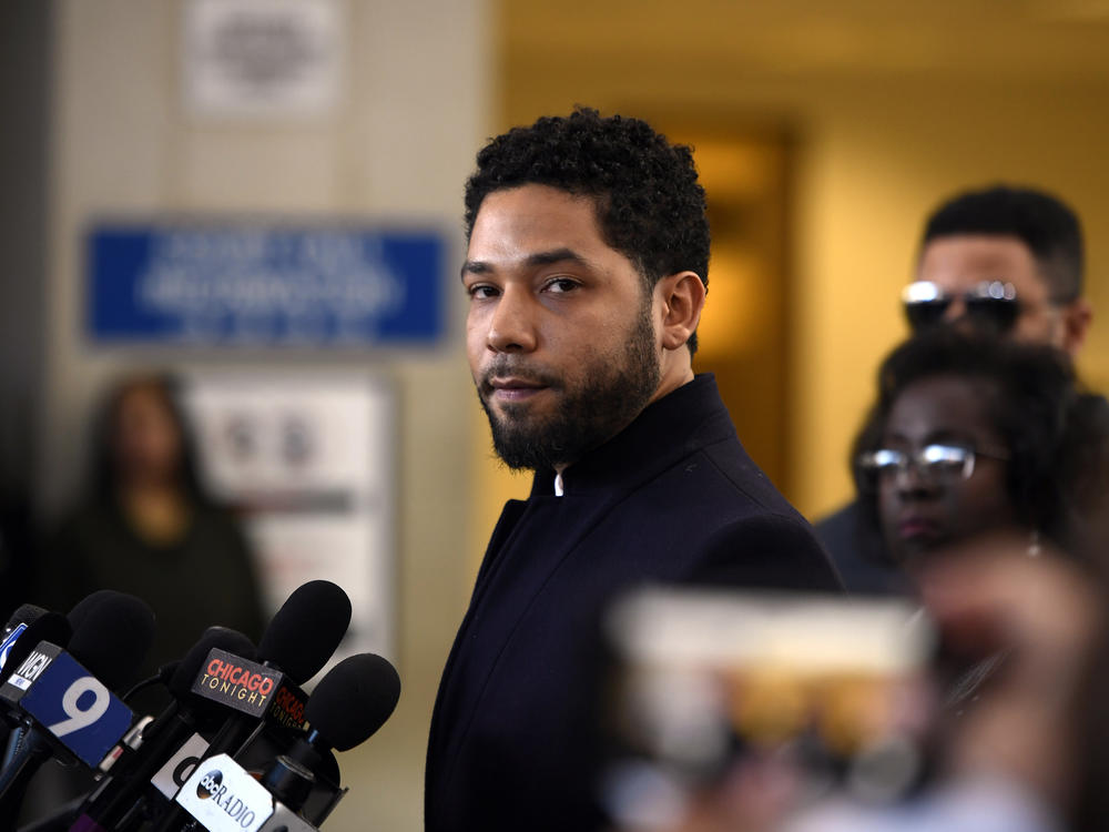 Jussie Smollett talks to the media in 2019 before leaving the court in Cook County, Ill. The actor will face sentencing on Thursday.