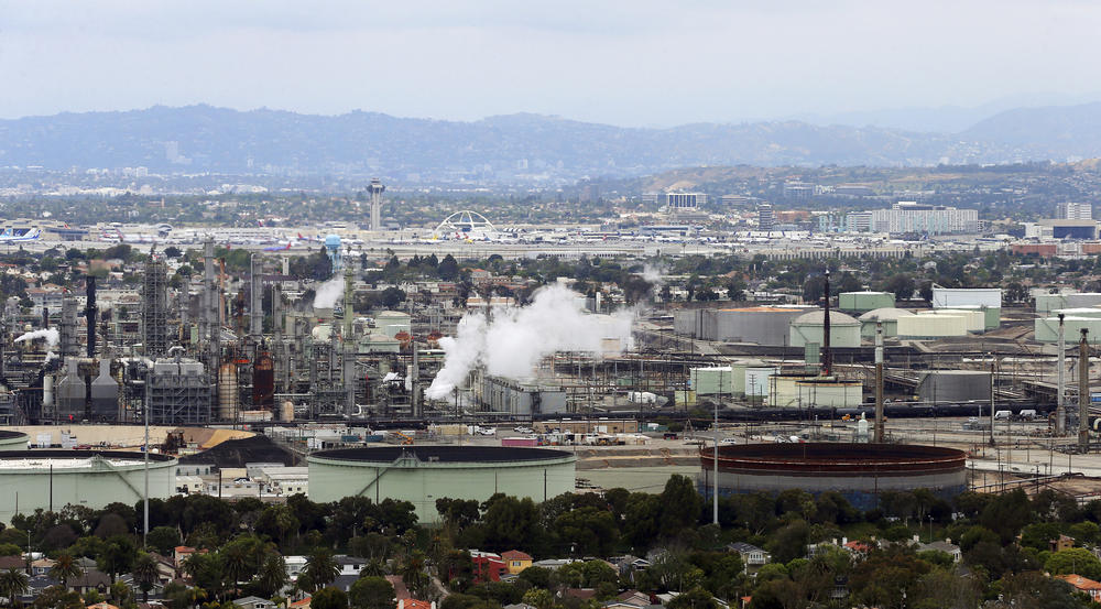 The Standard Oil Refinery in El Segundo, Calif., the El Porto neighborhood of Manhattan Beach, Calif., in the foreground, is seen on May 25, 2017.