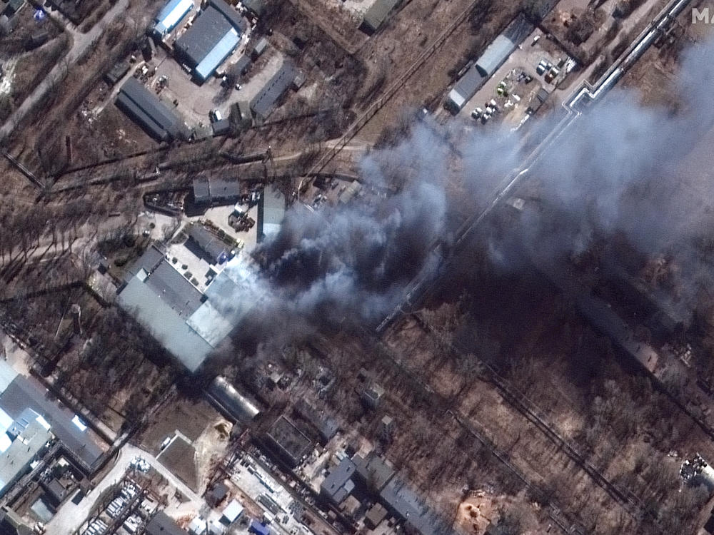This satellite image provided by Maxar Technologies shows a closeup view of fires in an industrial area and nearby fields in southern Chernihiv, Ukraine, during the Russian invasion on Thursday.