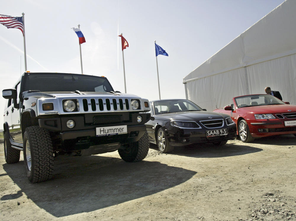 Cars produced by General Motors are on display at the ground-breaking ceremony of a GM plant in Shushary, on the outskirts of St. Petersburg, Russia, on June 13, 2006.