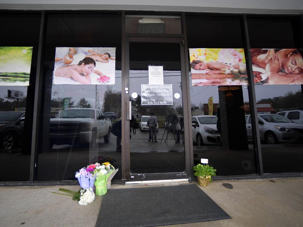 A makeshift memorial is seen outside one of the spas targeted in the shooting that occurred on March 16, 2021, in Acworth, Ga.