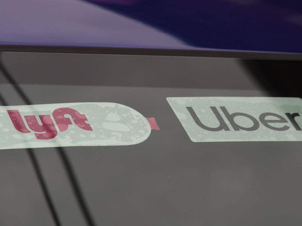 Ride-share companies Lyft and Uber announced they will add a temporary surcharge on their rides to help their drivers deal with the rise in gas prices.