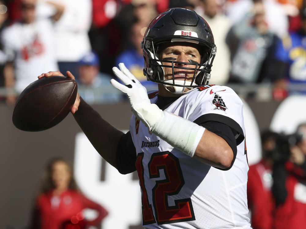 Tampa Bay Buccaneers quarterback Tom Brady throws a pass against the Los Angeles Rams during the first half of an NFL divisional round playoff football game in January in Tampa, Fla. Brady's retirement lasted 40 days. He said Sunday, March 13, he is returning to the Buccaneers for his 23rd season in the NFL.