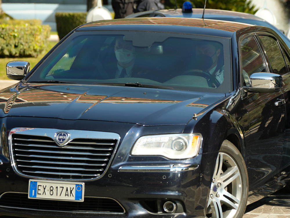 A car carrying members of the Chinese delegation leaves the Cavalieri Hilton hotel in Rome, where U.S. national security adviser Jake Sullivan and Chinese diplomat Yang Jiechi met on Monday.