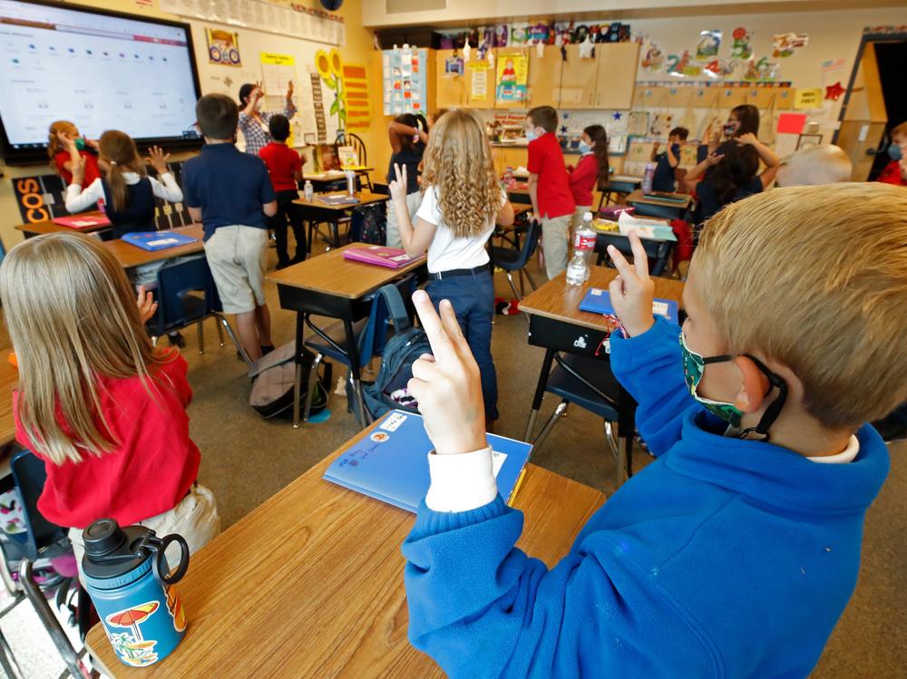 Students wear masks as a teacher instructs them at Freedom Preparatory Academy on Sept. 10, 2020 in Provo, Utah.