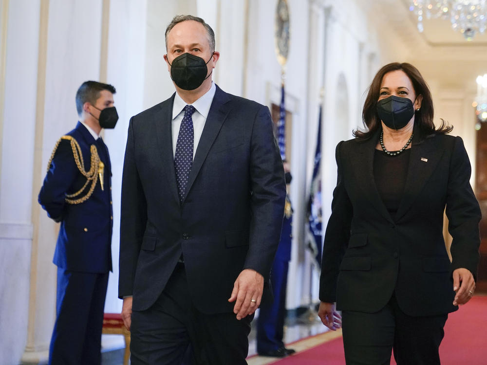 Vice President Kamala Harris and second gentleman Doug Emhoff arrive before President Joe Biden speaks at an event to celebrate Black History Month in the East Room of the White House, Monday, Feb. 28, 2022, in Washington.