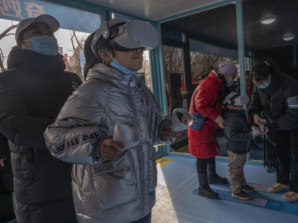 Children play a virtual reality game a Beijing 2022 Winter Olympics Live Site set up on February 07, 2022 in Beijing, China.