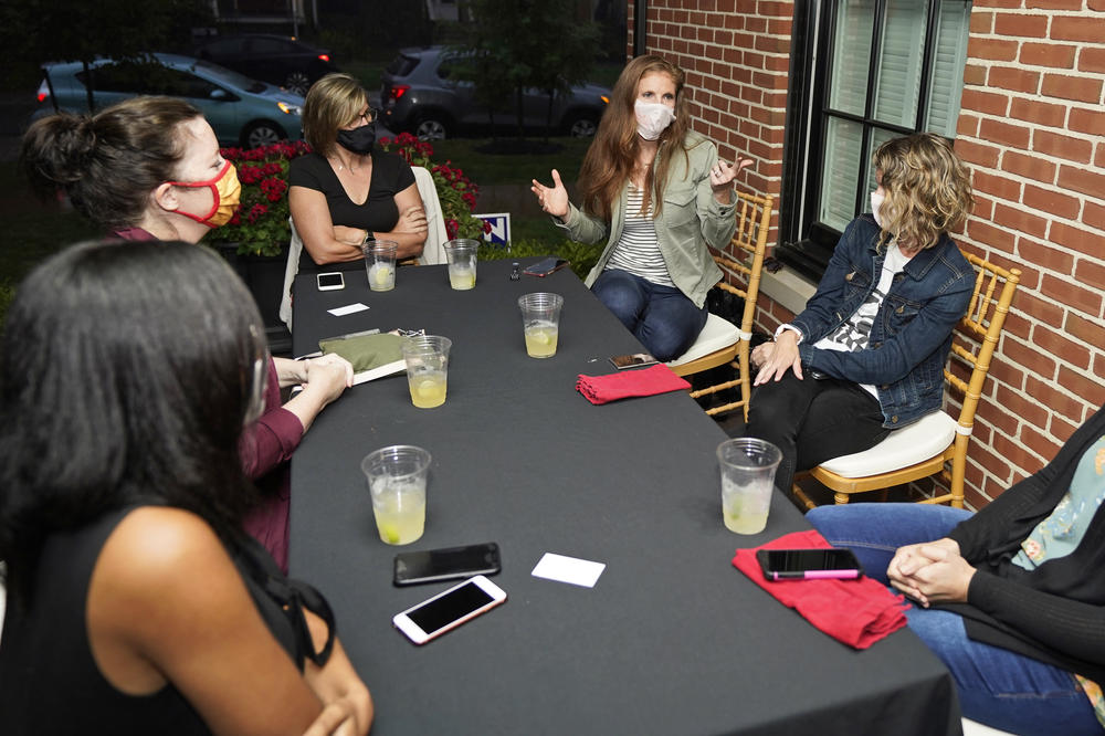Katie Paris speaks to members of Red, Wine and Blue during a meeting, Monday, Sept. 28, 2020, in Cleveland.