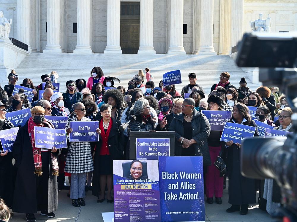Activists hold a news conference in front of the U.S. Supreme Court on March 10 asking for the confirmation of Judge Ketanji Brown Jackson to the court.