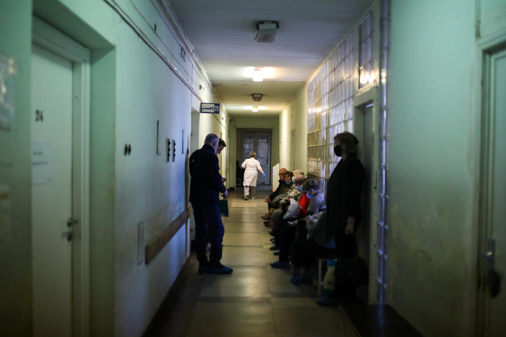 Patients wait in a hospital hallway in Lviv. They receive treatment in the morning and don't stay overnight because it's too hard to get hundreds of patients into the shelter in the case of an air raid siren.