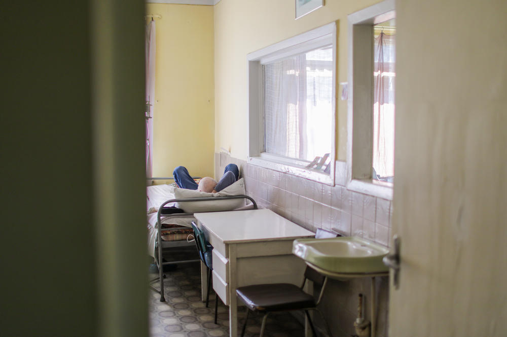 A patient lies in one of the many full hospital beds in Lviv.