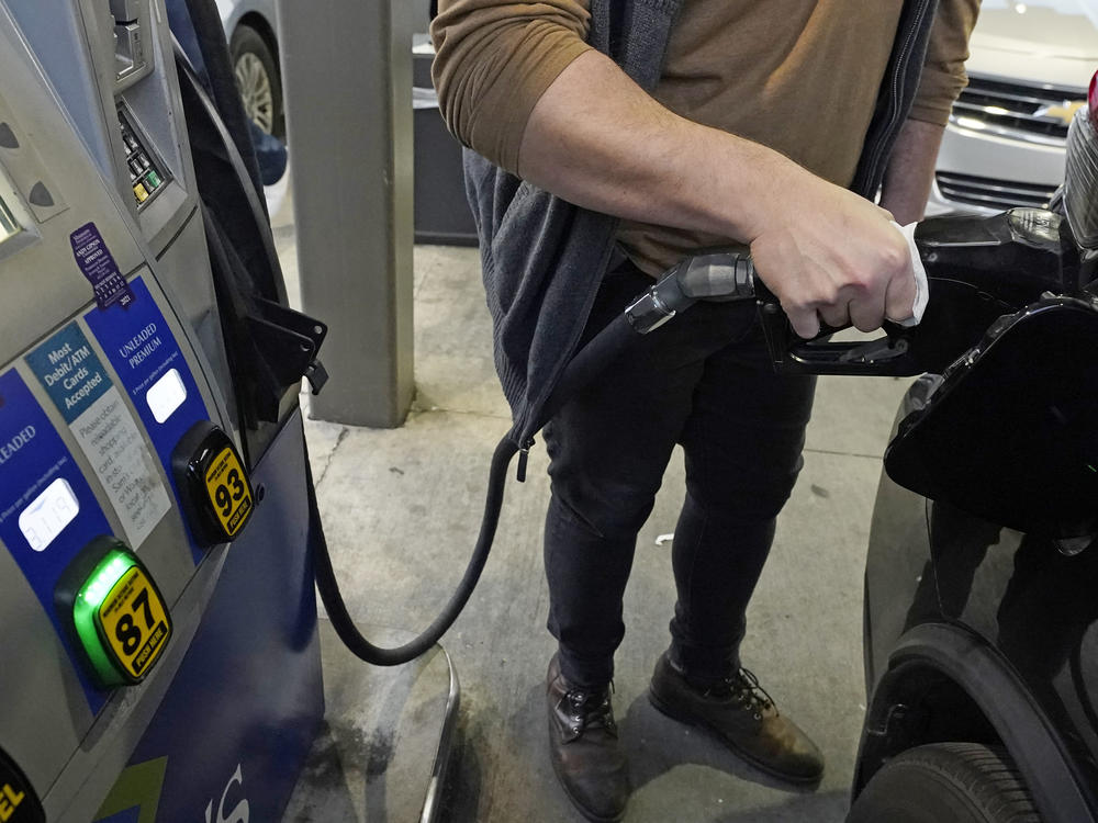 A customer pumps gasoline into his car in Gulfport, Miss., on Feb. 19.
