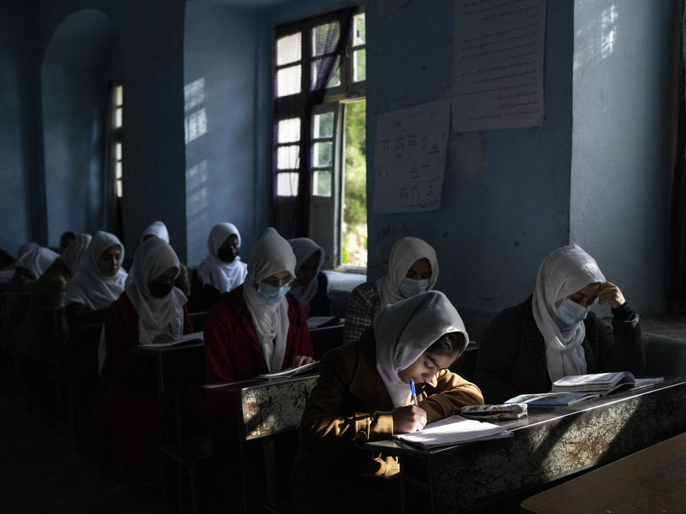 Afghan girls participate in a lesson at a high School, in Herat, on Nov. 25, 2021.