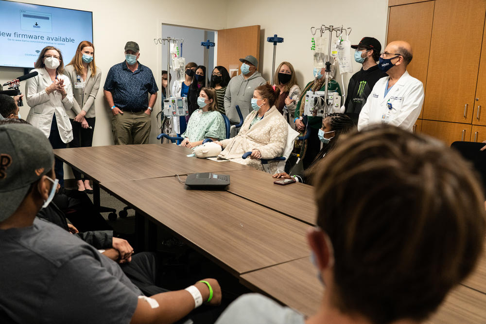 Kidney donors and recipients gather in a conference room during a donor/recipient revealing at the hospital on March 3.