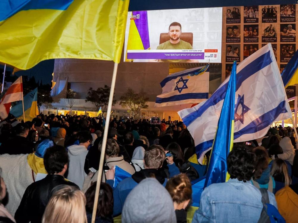 Demonstrators gather at Habima Square in Tel Aviv on Sunday to attend a televised video address by Ukraine's President Volodymyr Zelenskyy.