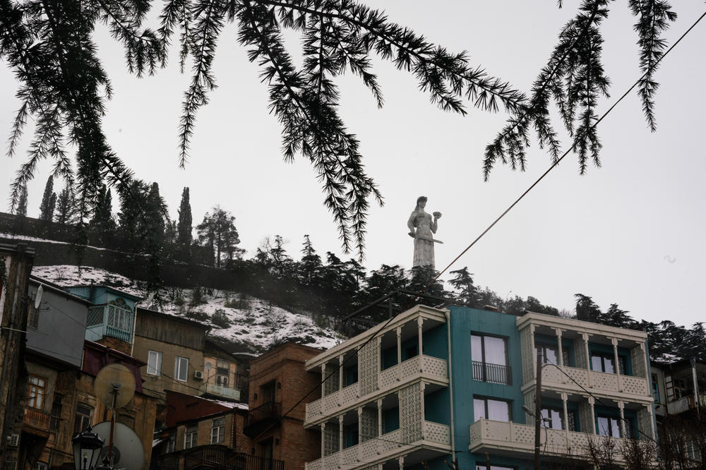 The Mother of Georgia statue looms over Tbilisi, welcoming visitors with a jug of wine in one hand and a sword in the other.