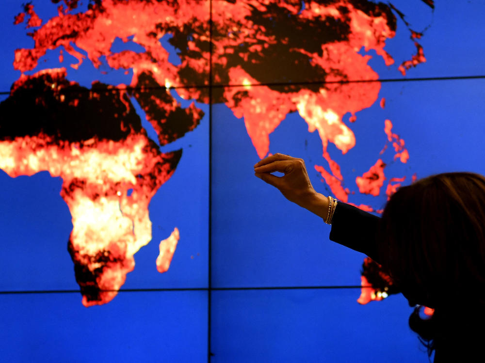 Vice President Harris looks at a hyperwall during a climate change discussion at the  Goddard Space Flight Center in Greenbelt, Md., on Nov. 5 , 2021. The SEC unveiled new proposals on Monday requiring companies to disclose climate-related risks.