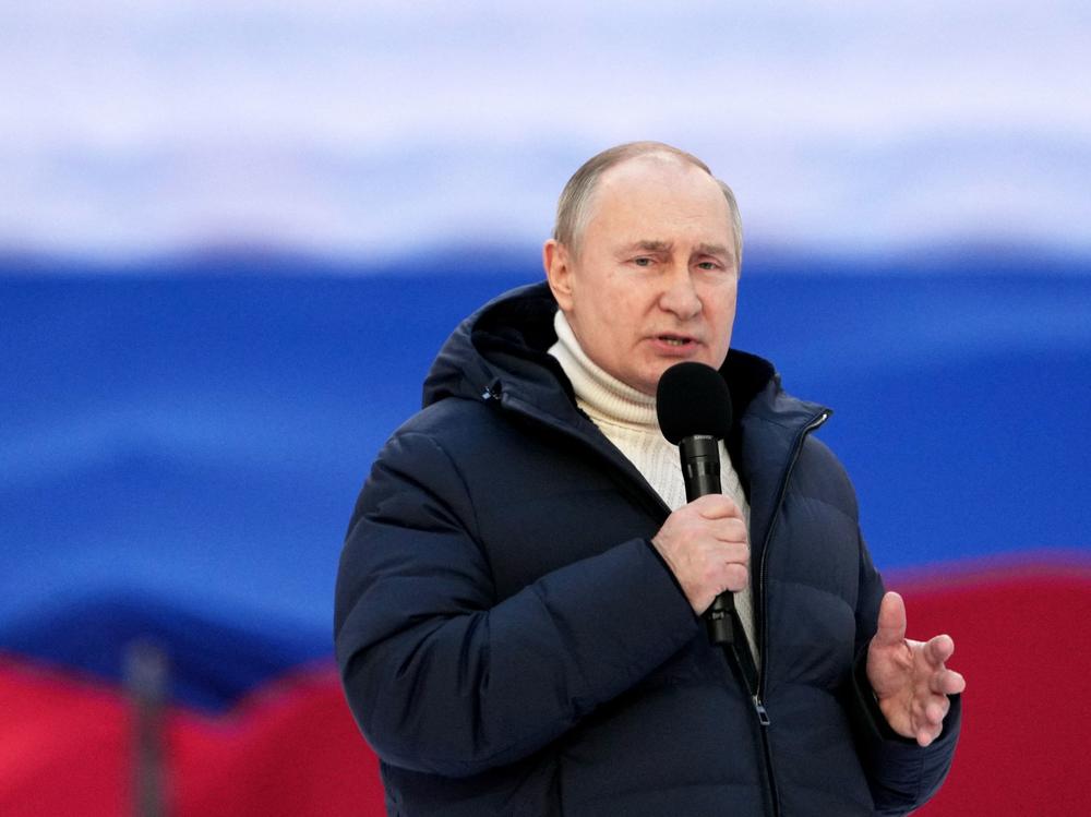 Russian President Vladimir Putin gives a speech at a concert marking the eighth anniversary of Russia's annexation of Crimea at the Luzhniki stadium in Moscow on March 18, 2022.