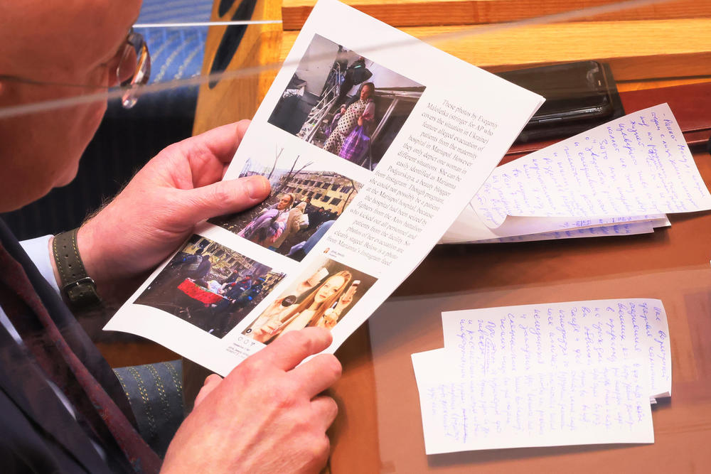 Ambassador Vassily Nebenzia, permanent representative of the Russian Federation, holds documents during a U.N. Security Council meeting discussing the Russian and Ukraine conflict on March 11. The U.N. Security Council met at Russia's request to discuss Russia's claim of U.S.-supported chemical and biological weapons labs in Ukraine.