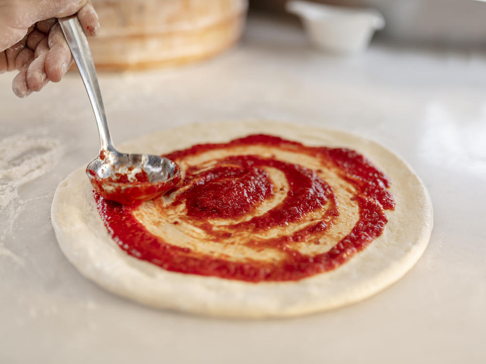 Traditionally, pizza dough is made by allowing yeast to ferment the flour and water until air bubbles form in the dough. But scientists in Naples are developing a new approach – one that doesn't rely on yeast.
