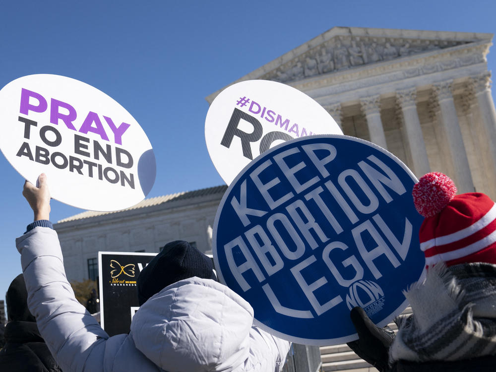 Activists from both sides of the abortion debate participate in a demonstration outside of the U.S. Supreme Court in January.