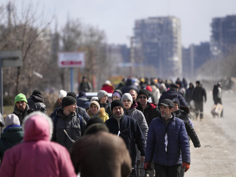 Civilians are evacuated along humanitarian corridors from Mariupol on March 20.