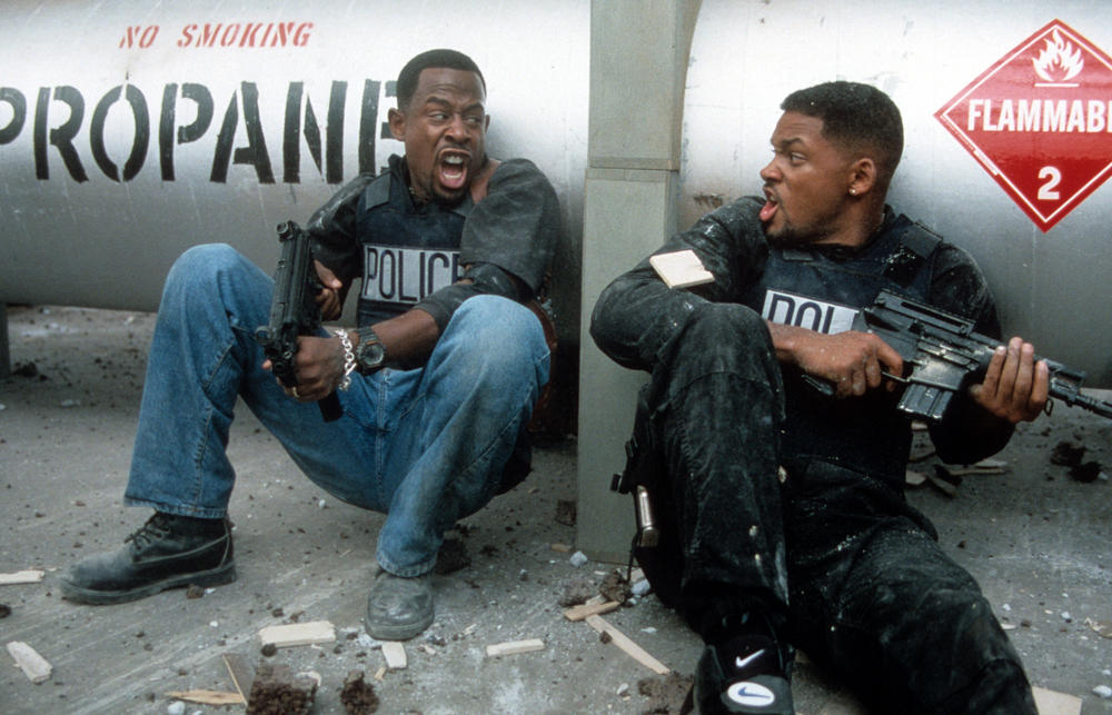 Martin Lawrence and Will Smith defend themselves in a scene from the film <em>Bad Boys</em>.