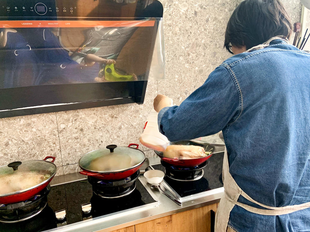 Chef Peter — he doesn't want his full name used because he wants to keep his restaurant out of the limelight — prepares duck, which will be finished off with his special Lu sauce (with soy sauce, ginger, garlic and a special ingredient donated by his late mother).