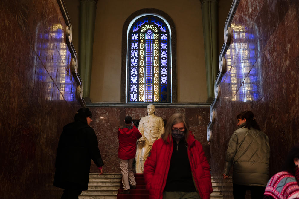 Tourists wander the halls of the Stalin museum in Gori, Georgia.