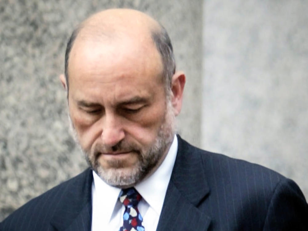 Attorney Mark Pomerantz is shown leaving court in New York on Sept. 8, 2004.
