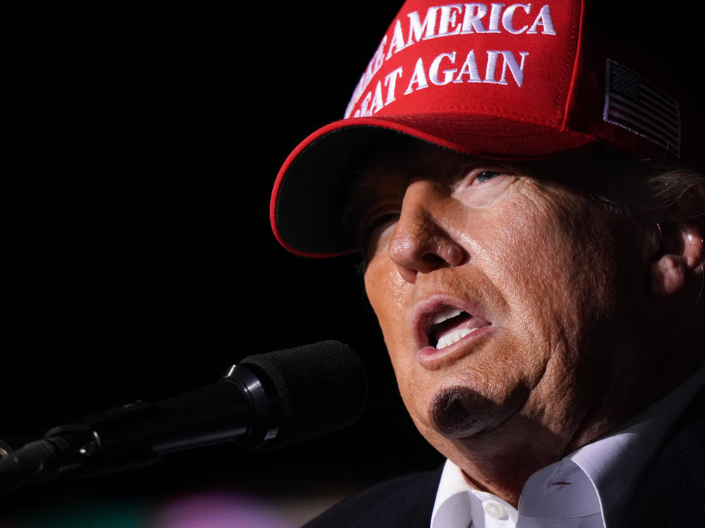 Former President Donald Trump speaks to the crowd on March 12, 2022 in Florence, S.C. On Thursday he filed lawsuit against Hillary Clinton, the DNC and others.