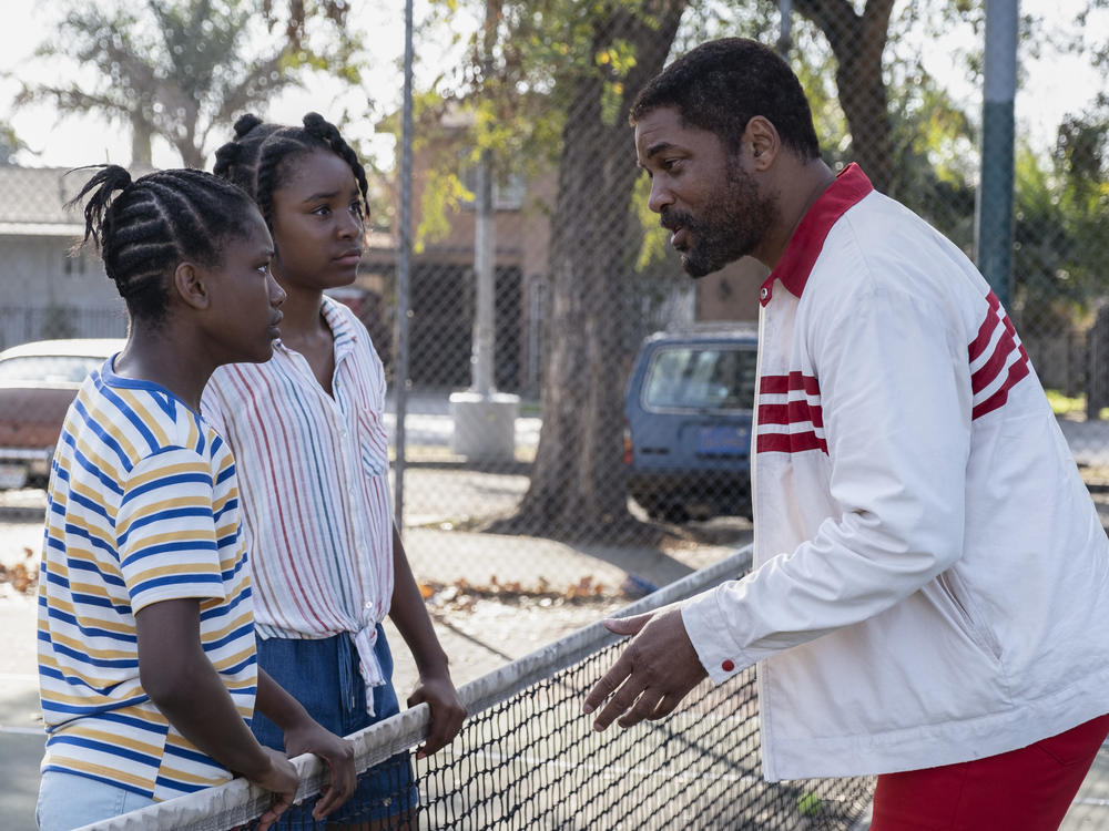 Demi Singleton and Saniyya Sidney with Will Smith in <em>King Richard.</em>