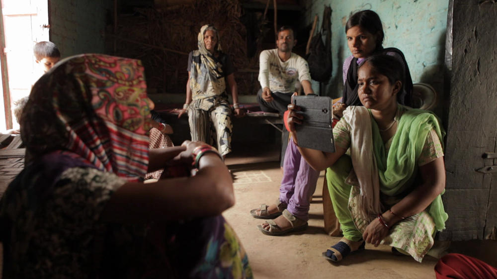 The Oscar-nominated documentary <em>Writing With Fire</em> follows Meera Devi (right), chief reporter for Khabar Lahariya — a news publication run by members of India's lowest caste. Staff members are now saying their depiction in the film misrepresents them.<em></em>