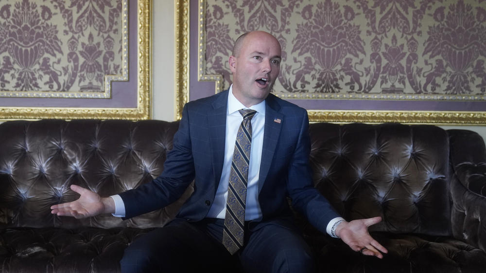 Utah Gov. Spencer Cox speaks during an interview at the Utah State Capitol on Friday. He vetoed a ban on transgender students playing girls' sports on Tuesday.