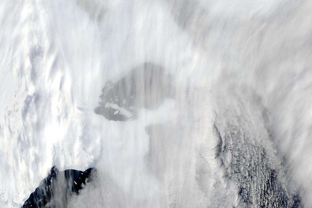 This satellite image shows the original extent of C-37 through clouds next to Bowman Island.
