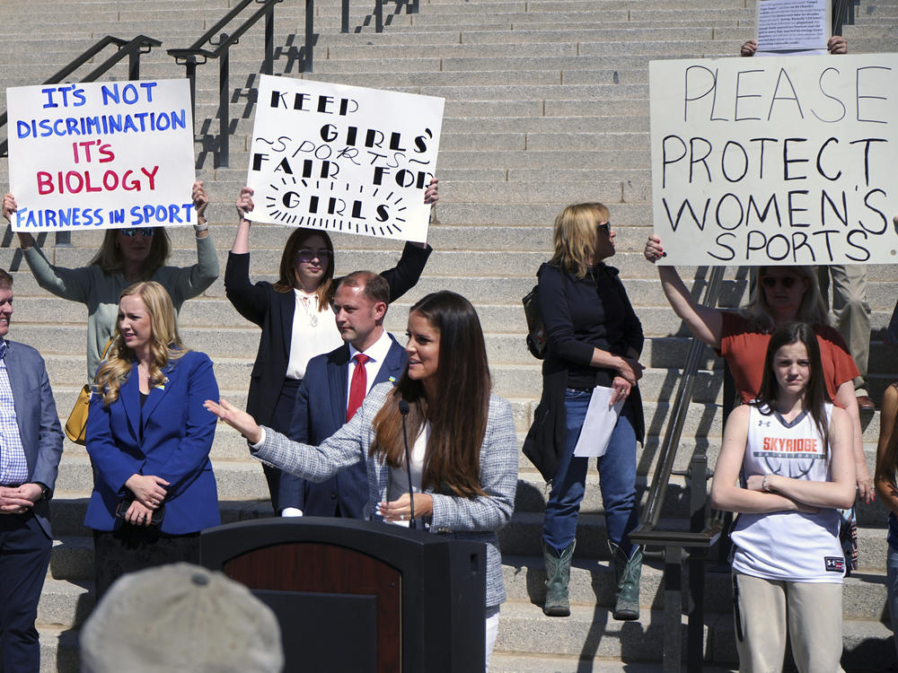 State Rep. Kera Birkeland, a Republican high school basketball coach who led Utah's efforts to ban transgender girls from youth sports, addresses a crowd of supporters on the steps of the Utah State Capitol on Friday in Salt Lake City.