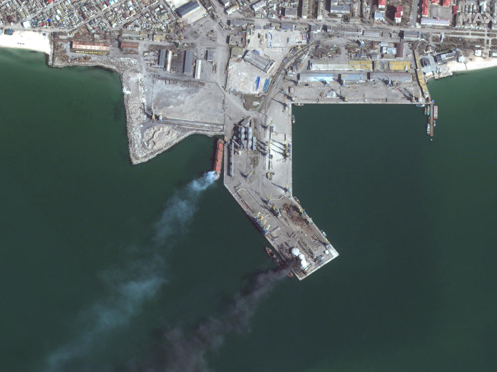Maxar collected new satellite imagery of the southern Ukrainian port city of Berdyansk that reveals a Russian Alligator-class landing ship that is burned and partially submerged near one of the port's loading/unloading quays. Fire and smoke is also seen nearby and close to several fuel storage tanks.