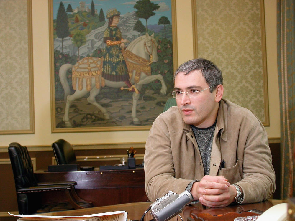 Mikhail Khodorkovsky, then the CEO of the Russian oil company Yukos, poses for photographs in his private office in 2003.