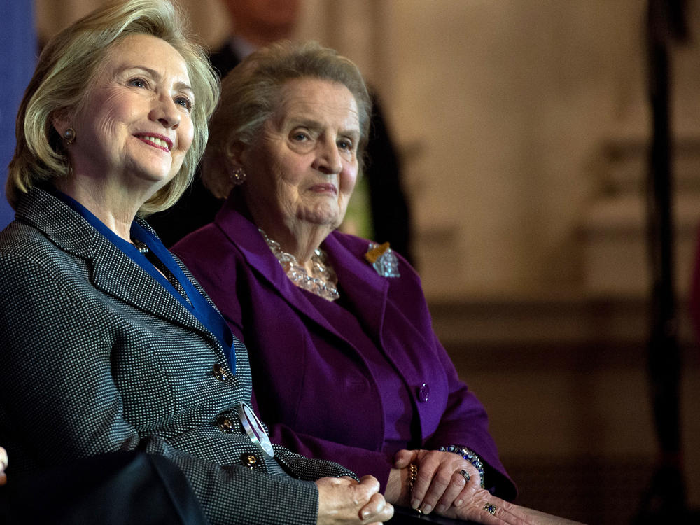 Former U.S. Secretaries of State Hillary Clinton and Madeleine Albright listen to a speaker after Clinton received the 2013 Lantos Human Rights Prize in 2013. Albright worked to support other women throughout her career.