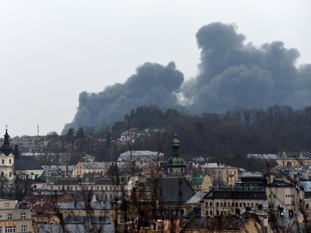 Dark smoke rises from a fire following an airstrike in the western Ukrainian city of Lviv on Saturday.