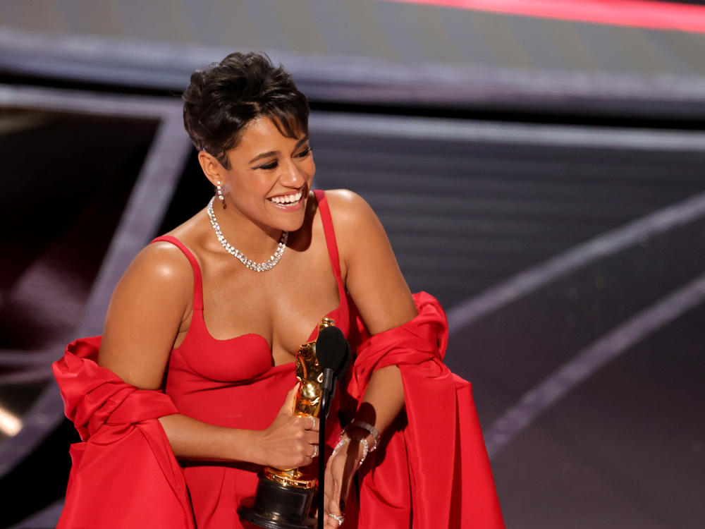 Ariana DeBose accepts the Oscar for best actress in a supporting role.