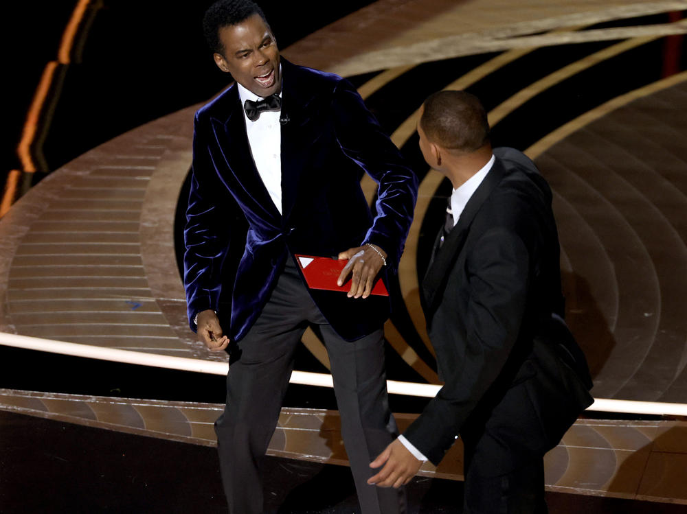 Chris Rock and Will Smith are seen onstage during the 94th Annual Academy Awards at Dolby Theatre following what appeared to be an altercation.