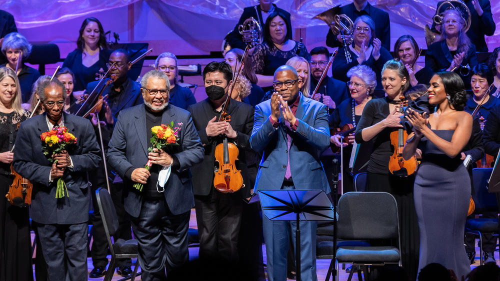 From left: Librettist Dr. Herbert Martin, composer Dr. Adolphus Hailstork, Chorus Master Eugene Rogers, mezzo-soprano J'Nai Bridges and, behind, the National Philharmonic Orchestra.