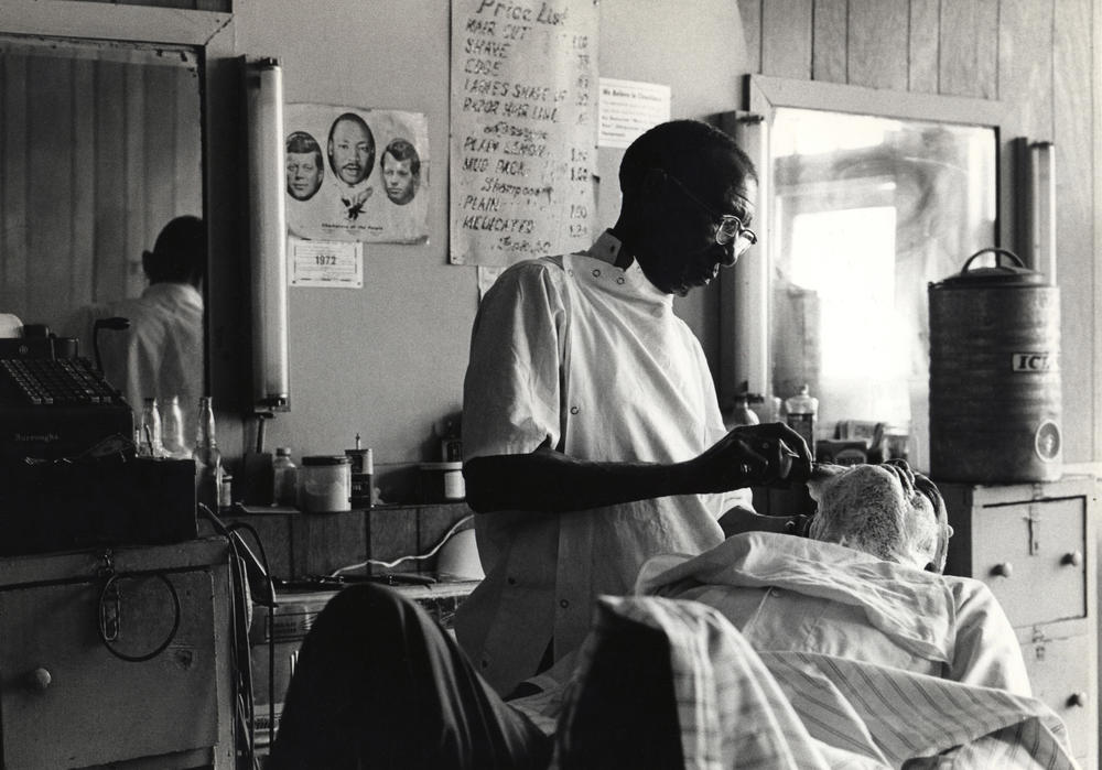 A local barbershop in Tuskegee, AL, 1972.