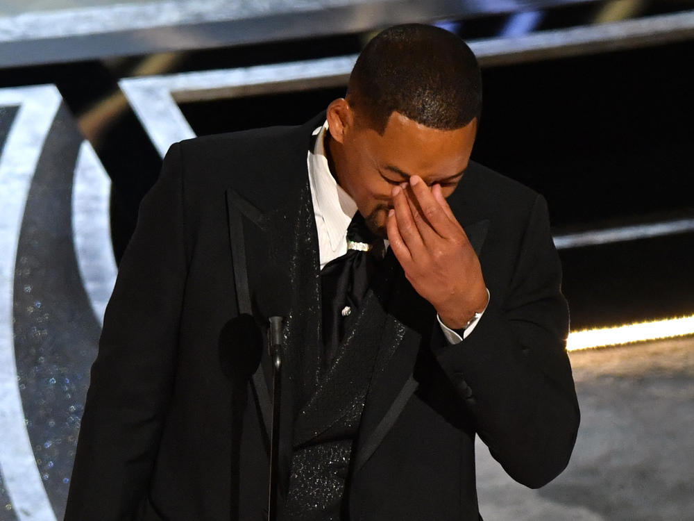 Will Smith accepts the award for best actor in a leading role for <em>King Richard</em>, not long after slapping Chris Rock onstage at the Oscars.