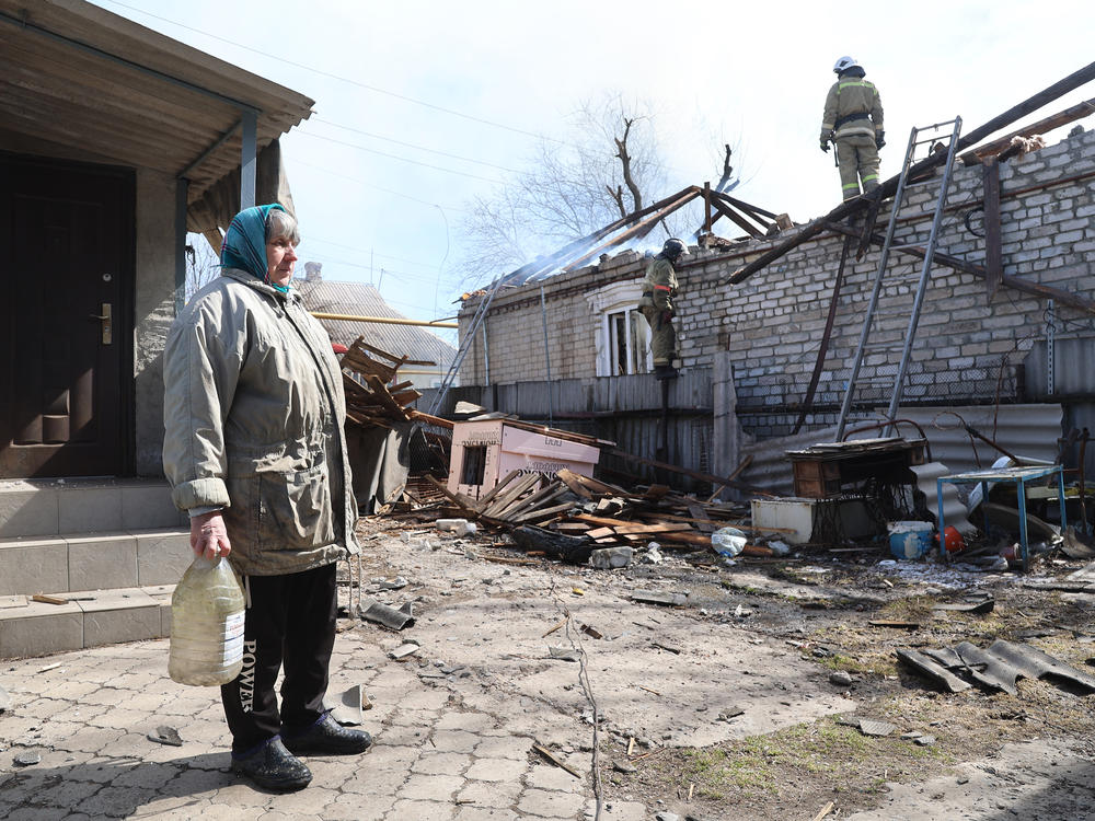 A view of some of the damage after shelling in pro-Russian, separatist-controlled Donetsk, in eastern Ukraine's Donbas region, on Monday. Several houses and garages were damaged, and some homes were completely burned down.