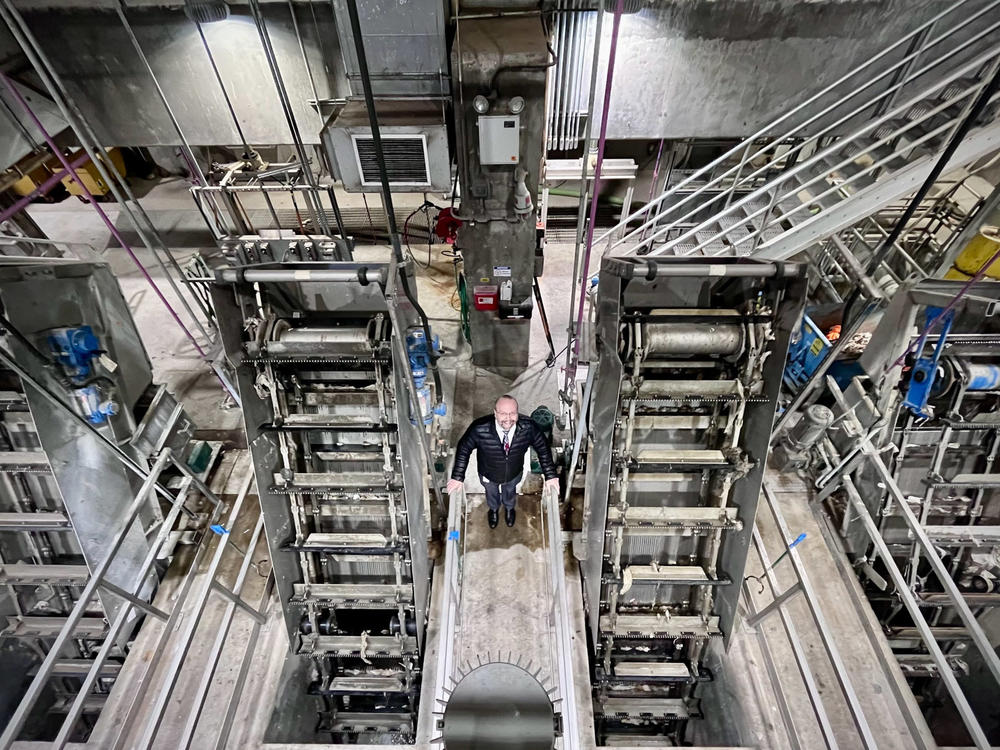 Pieter Van Ry, director of the South Platte Renew wastewater treatment facility in Englewood, Colo., stands surrounded by solid-waste separators.