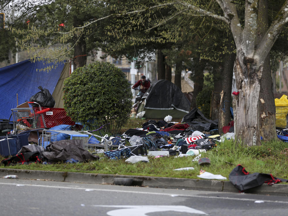 A homeless camp is seen after a vehicle crashed into the camp, killing several people, on Sunday, in Salem, Ore.