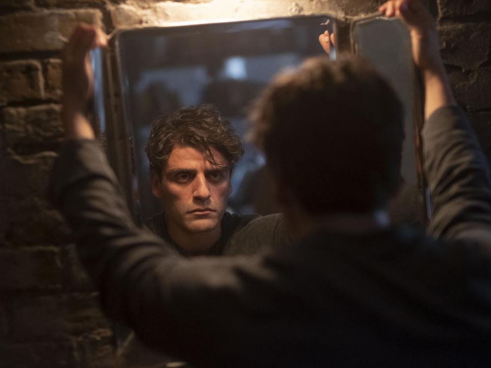 Steven Grant (Oscar Isaac) reflects on his predicament in Disney 's <em>Moon Knight</em>.